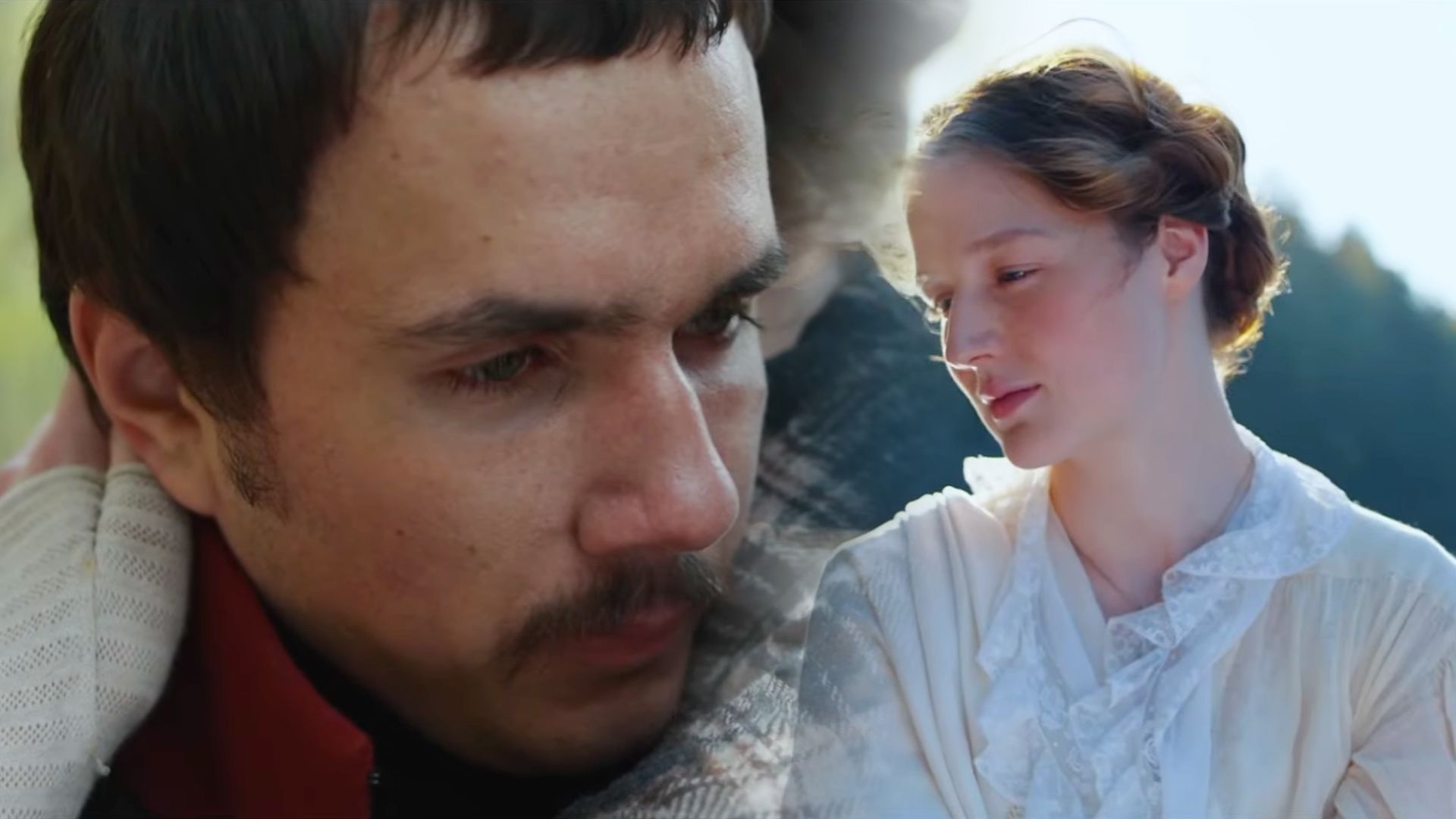 Актер Илья Озолин с усами смотрит вниз, справа девушка в белой блузке