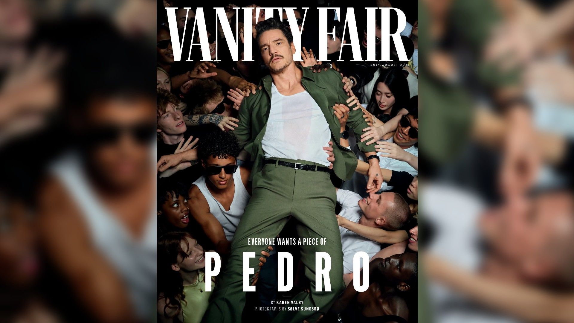 Педро Паскаля несут на руках, сверху надпись Vanity Fair