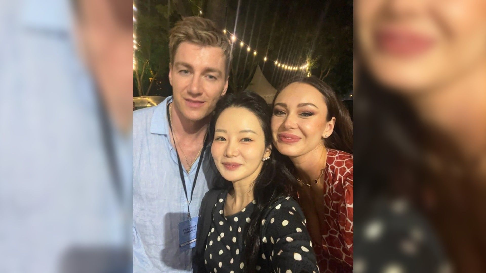 Алексей Воробьёв и Аида Гарифуллина делают селфи со скрипачкой Бом Со Ри