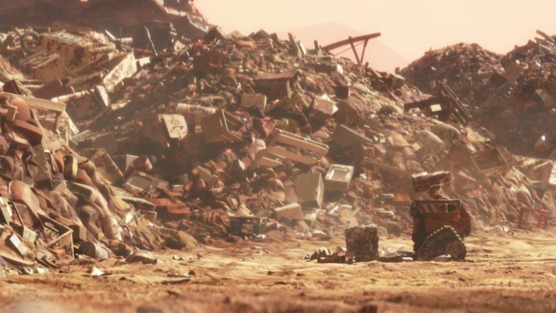 Робот ВАЛЛ-И разбирает кучи мусора